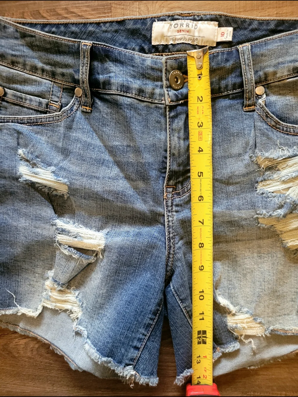 torrid light blue distressed jean shorts